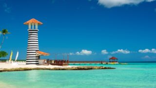 Lighthouse on the beach of the Caribbean, Dominican Republic, Bayahibe beach in La Romana