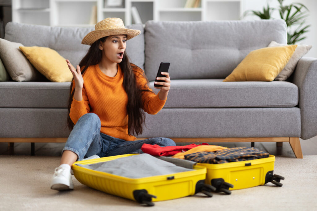 Surprised Traveler Packing Suitcase