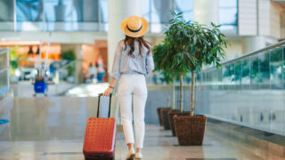 Woman with a Carry On Suitcase