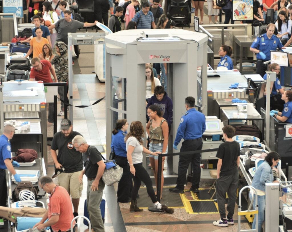 Passengers screening at TSA checkpoing