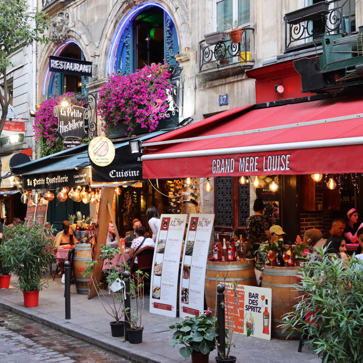 Tourists, restaurants and cafes in the Latin Quarter of Paris, France