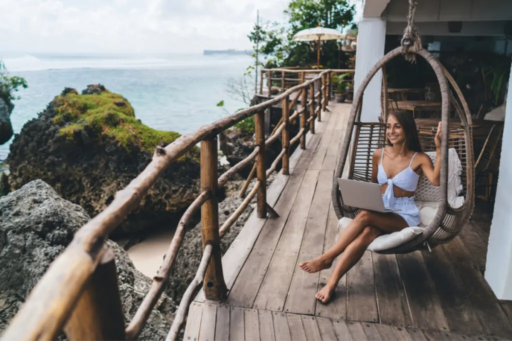 Digital Nomad at a Beach Cafe