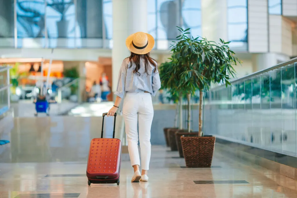 Woman with a Carry On Suitcase